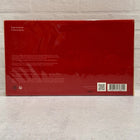 Actual Baccarat Rouge 540 Extrait travel-set box back showing five 11 mL refills and gold Globe Trotter contents