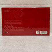 Actual Baccarat Rouge 540 Extrait travel-set box back showing five 11 mL refills and gold Globe Trotter contents