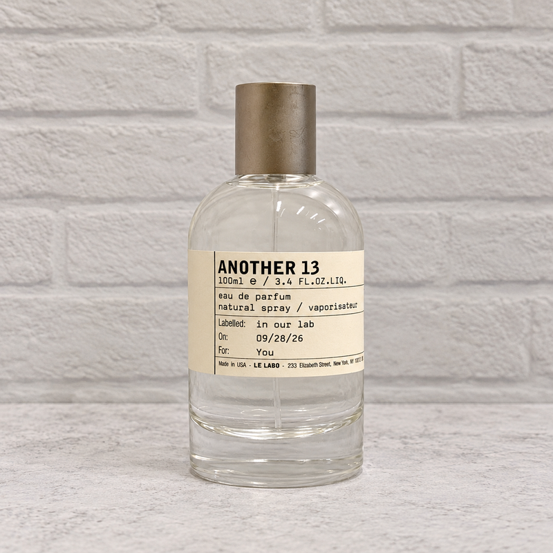 Another 13 tester bottle with cap, front view