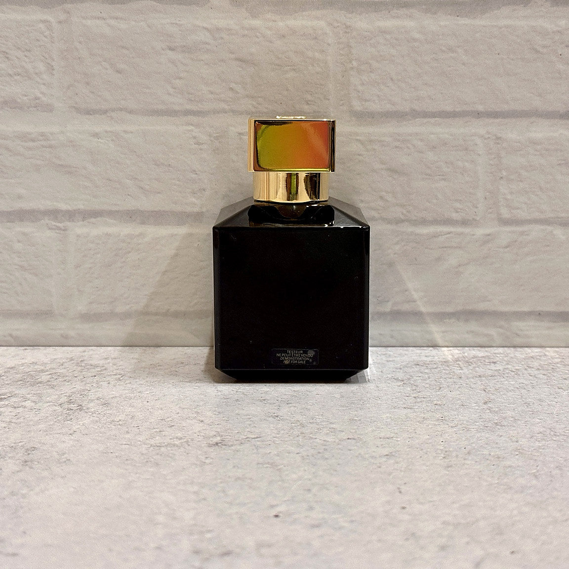 Back view showing tester marking on Oud Velvet Mood Extrait 70 mL bottle